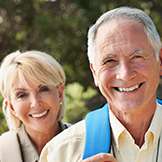 Couple smiling showing their white smile