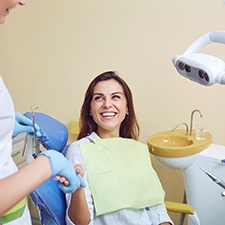 Patient shaking hands with a cosmetic dentist in Waco