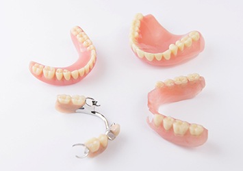 Different types of dentures in Waco on white background 