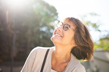 Lady smiles at sun