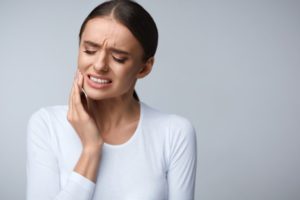 Woman with tooth pain