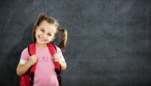 child with backpack